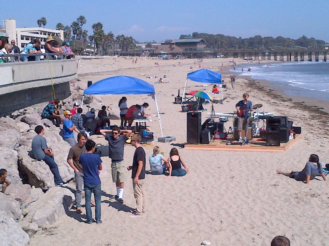 A band setting up to play on the sand at Surfer&rsquo;s Point