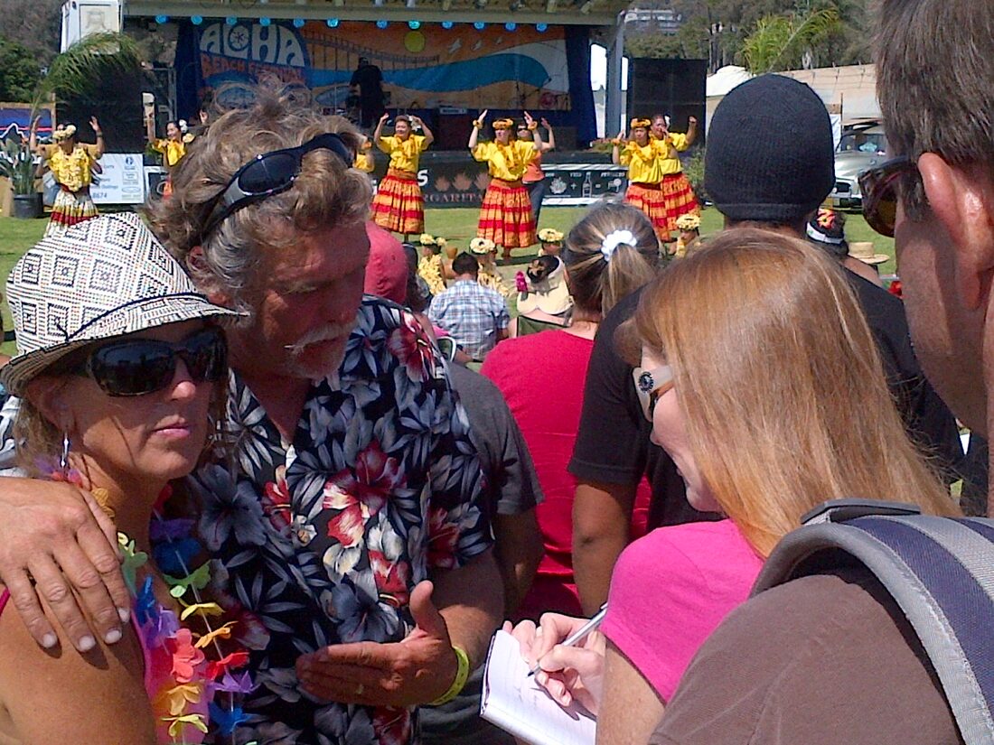 Festival-goers in aloha shirts gathered near the Main Stage